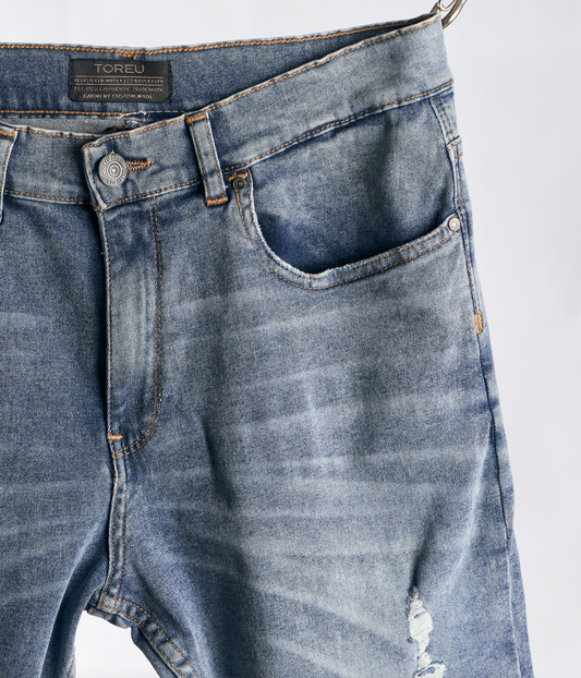 Jean Luxo con roturas · Slim Fit