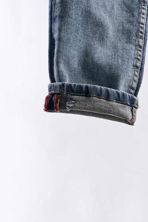 Jean Luxo con roturas · Slim Fit