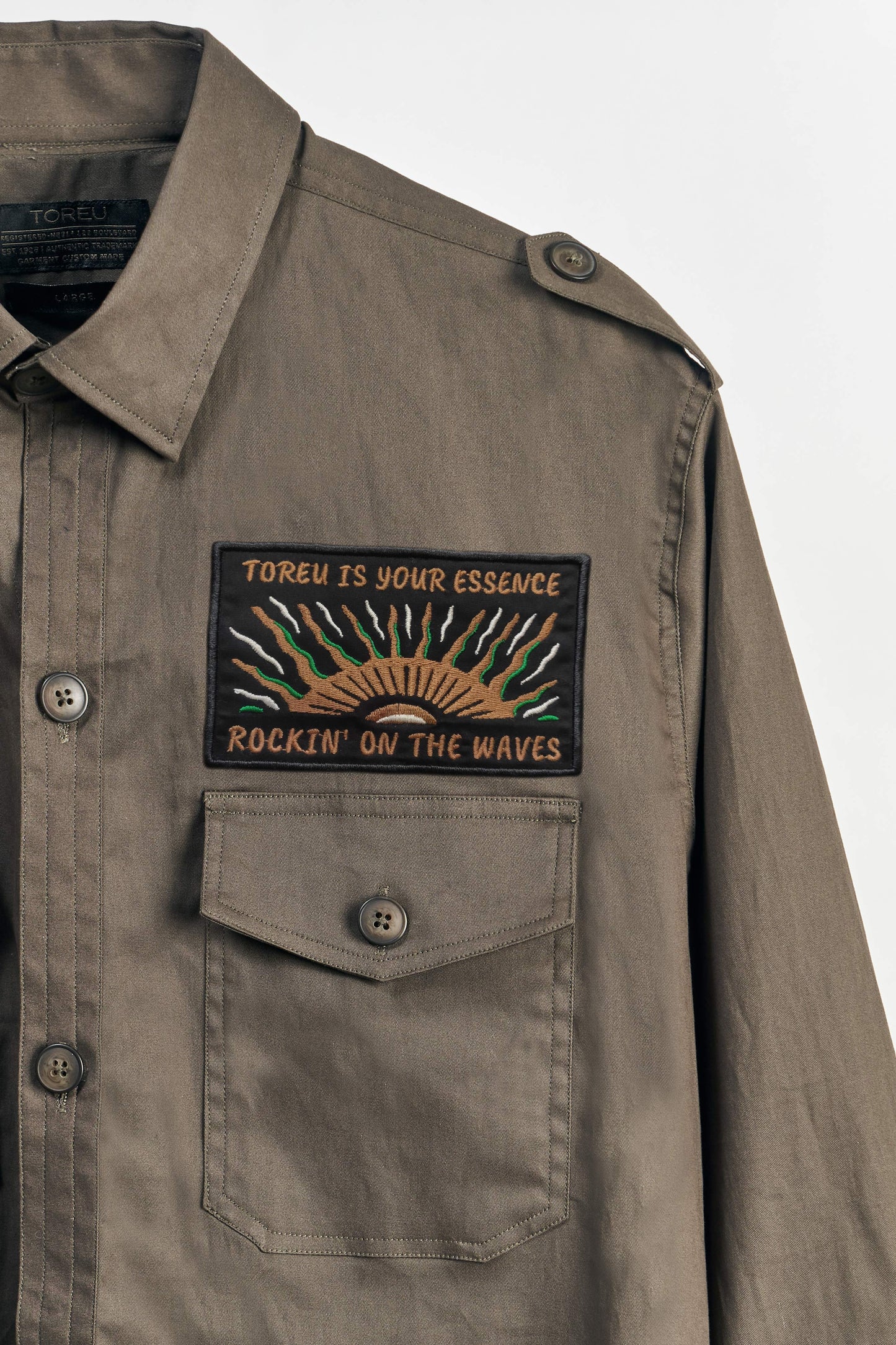 Jacket ANTIBES · Gabardina estampada
